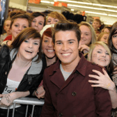 Look at the delight on the faces of these fans as they enjoy a very special moment. Photo: Stu Norton