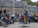 Graham Linehan performs outside Scottish Parliament days after Edinburgh Fringe cancelled Father Ted creator