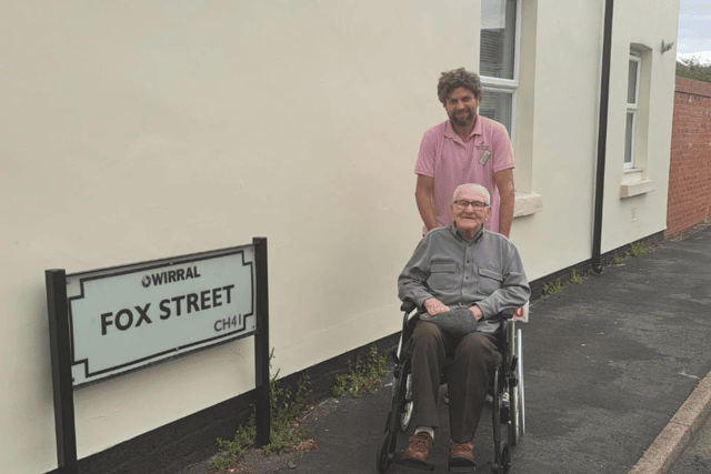 Thomas on the street that he grew up on in Birkenhead. Photo: Other 3rd Party.