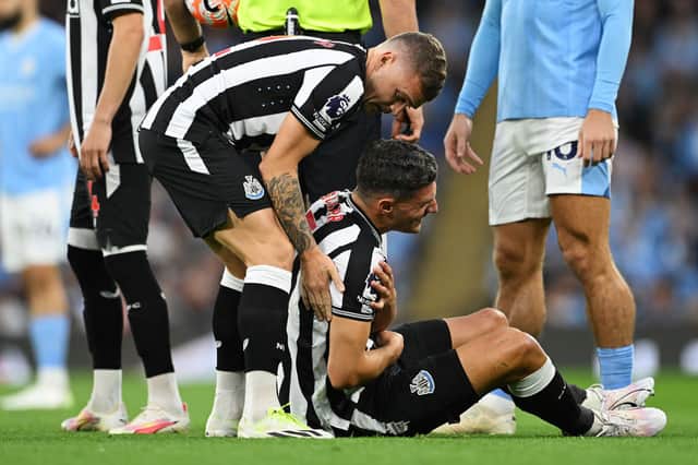 Newcastle United defender Fabian Schar went down with a shoulder injury early into the clash with Manchester City.