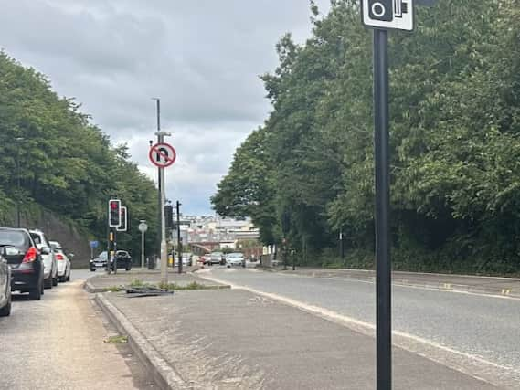 Police close off the Bath Road from the Three Lamps Signpost