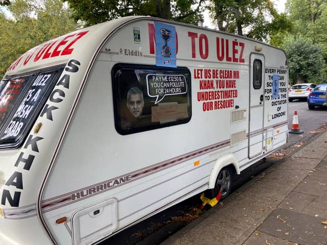 This caravan covered in ULEZ protest slogans was chained outside Sadiq Khan’s house in Tooting, London.