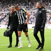 Sven Botman limped off against Liverpool (Image: Getty Images)
