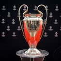 This photograph taken on August 31, 2023, shows the UEFA Champions League football trophy cup during the ceremony for the draw of the UEFA Champions League football tournament 2023-2024 at The Grimaldi Forum in the Principality of Monaco. (Photo by NICOLAS TUCAT / AFP) (Photo by NICOLAS TUCAT/AFP via Getty Images)