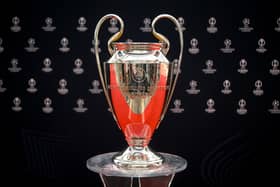 This photograph taken on August 31, 2023, shows the UEFA Champions League football trophy cup during the ceremony for the draw of the UEFA Champions League football tournament 2023-2024 at The Grimaldi Forum in the Principality of Monaco. (Photo by NICOLAS TUCAT / AFP) (Photo by NICOLAS TUCAT/AFP via Getty Images)