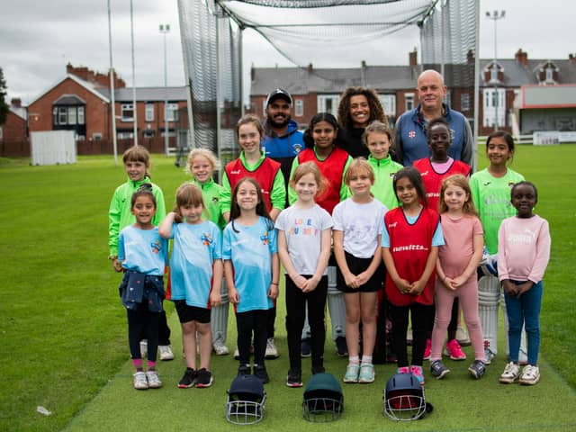 South Shields Cricket Club's young players, along with (back, centre) Jamilah Hassan of The Banks Group and (left) Tharusha Fernando and Patrick William-Powlett of South Shields Cricket Club Credit: Footprint Public Relations