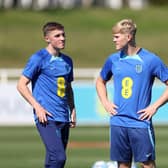 Alfie Devine, Lewis Hall and Bashir Humphreys look on during a training session at St Georges Park on September 05, 2023 in Burton-upon-Trent, England. (Photo by Catherine Ivill/Getty Images)