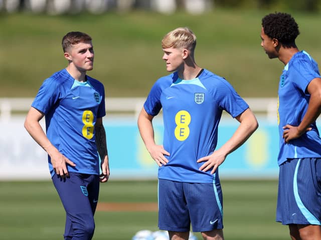 Alfie Devine, Lewis Hall and Bashir Humphreys look on during a training session at St Georges Park on September 05, 2023 in Burton-upon-Trent, England. (Photo by Catherine Ivill/Getty Images)