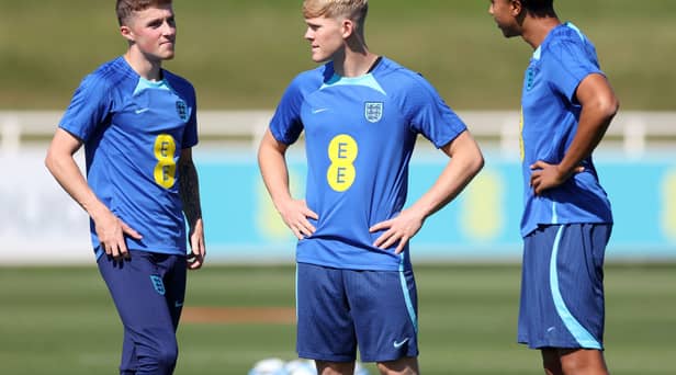 Alfie Devine, Lewis Hall and Bashir Humphreys look on during a training session at St Georges Park on September 05, 2023 in Burton-upon-Trent, England. (Photo by Catherine Ivill/Getty Images)