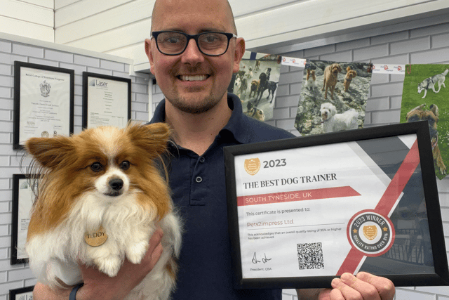 Tim with Teddy, a dog who uses Pets2impress’ daycare service. Photo: Other 3rd Party.