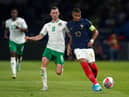 Alan Browne up against Kylian Mbappe.  