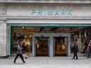 A pedestrian walks past a Primark store on Oxford Street, London.