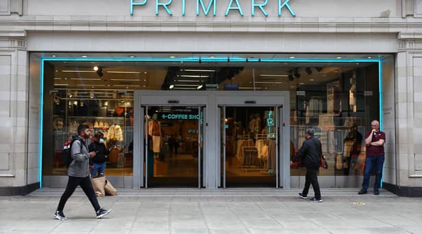 A pedestrian walks past a Primark store on Oxford Street, London.