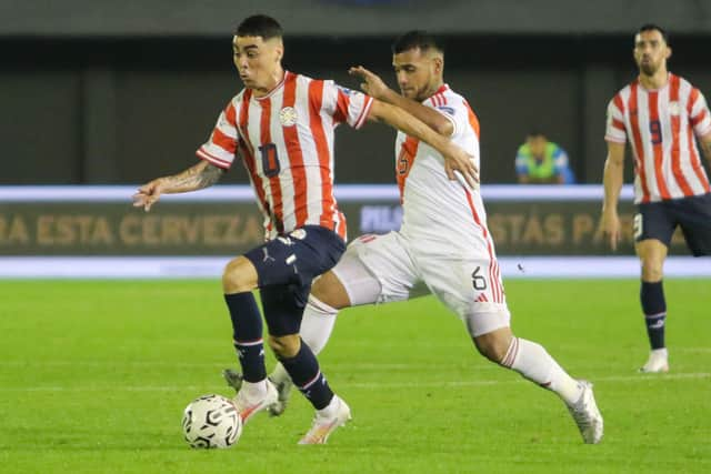  Miguel Almiron of Paraguay battles for possession with Miguel Trauco of Peru during a FIFA World Cup 2026 Qualifier match between Paraguay and Peru at Antonio Aranda Stadium on September 07, 2023 in Ciudad del Este, Paraguay. (Photo by Christian Alvarenga/Getty Images)