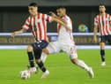  Miguel Almiron of Paraguay battles for possession with Miguel Trauco of Peru during a FIFA World Cup 2026 Qualifier match between Paraguay and Peru at Antonio Aranda Stadium on September 07, 2023 in Ciudad del Este, Paraguay. (Photo by Christian Alvarenga/Getty Images)