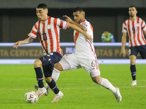  Miguel Almiron of Paraguay battles for possession with Miguel Trauco of Peru during a FIFA World Cup 2026 Qualifier match between Paraguay and Peru at Antonio Aranda Stadium on September 07, 2023 in Ciudad del Este, Paraguay. (Photo by Christian Alvarenga/Getty Images)
