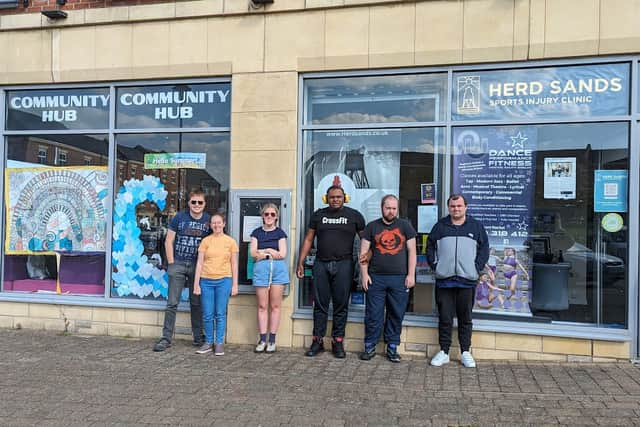 A group that will be involved in this project. They are standing outside the Westoe Crown Hub Building that is sited on the old colliery. Credit: Autism Able