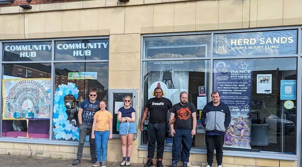A group that will be involved in this project. They are standing outside the Westoe Crown Hub Building that is sited on the old colliery. Credit: Autism Able