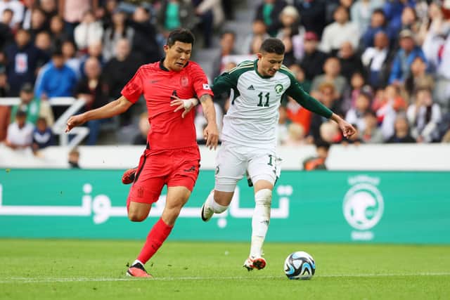 Kim Min-Jae of Republic of Korea is put under pressure by Abdullah Alhamddan of Saudi Arabia during the International Friendly match between Korea Republic and Saudi Arabia at St James' Park on September 12, 2023 in Newcastle upon Tyne, England. (Photo by Nigel Roddis/Getty Images)