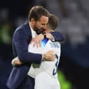 Gareth Southgate, Head Coach of England, embraces Kieran Trippier following the team's victory during the 150th Anniversary Heritage Match between Scotland and England at Hampden Park on September 12, 2023 in Glasgow, Scotland. (Photo by Ian MacNicol/Getty Images)
