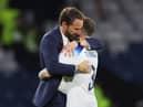 Gareth Southgate, Head Coach of England, embraces Kieran Trippier following the team's victory during the 150th Anniversary Heritage Match between Scotland and England at Hampden Park on September 12, 2023 in Glasgow, Scotland. (Photo by Ian MacNicol/Getty Images)
