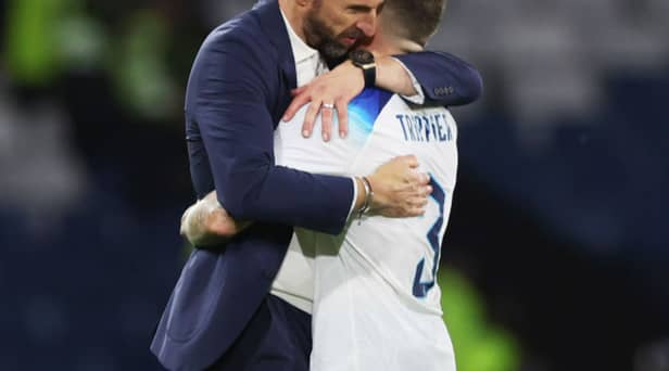 Gareth Southgate, Head Coach of England, embraces Kieran Trippier following the team's victory during the 150th Anniversary Heritage Match between Scotland and England at Hampden Park on September 12, 2023 in Glasgow, Scotland. (Photo by Ian MacNicol/Getty Images)