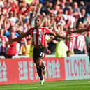 Jermaine Defoe admitted he ‘loved’ playing with Patrick van Aanholt (Image: Getty Images)