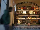 A pedestrian walks past a branch of a Patisserie Valerie cafe in London on January 23, 2019.