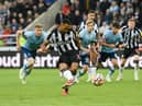 Callum Wilson of Newcastle United scores their sides first goal from the penalty spot during the Premier League match between Newcastle United and Brentford FC at St. James Park on September 16, 2023 in Newcastle upon Tyne, England.