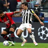 Ruben Loftus-Cheek of AC Milan challenges for the ball with Sandro Tonali of Newcastle United during the UEFA Champions League Group F match between AC Milan and Newcastle United FC at Stadio Giuseppe Meazza on September 19, 2023 in Milan, Italy. (Photo by Marco Luzzani/Getty Images)