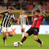  Bruno Guimaraes of Newcastle United challenges for the ball with Olivier Giroud and Christian Pulisic of AC Milan during the UEFA Champions League Group F match between AC Milan and Newcastle United FC at Stadio Giuseppe Meazza on September 19, 2023 in Milan, Italy. (Photo by Emilio Andreoli/Getty Images)