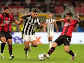  Bruno Guimaraes of Newcastle United challenges for the ball with Olivier Giroud and Christian Pulisic of AC Milan during the UEFA Champions League Group F match between AC Milan and Newcastle United FC at Stadio Giuseppe Meazza on September 19, 2023 in Milan, Italy. (Photo by Emilio Andreoli/Getty Images)