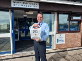 Headteacher Peter Bennett with the new medical equipmentCredit: Mortimer Primary School
