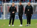  Lewis Hall (L), Lewis Miley (C) and Aidan Harris (R) of Newcastle United inspect the pitch prior to the UEFA Champions League Group F match between AC Milan and Newcastle United FC at Stadio Giuseppe Meazza on September 19, 2023 in Milan, Italy. (Photo by Emilio Andreoli/Getty Images)