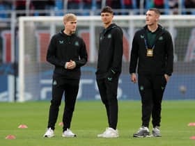  Lewis Hall (L), Lewis Miley (C) and Aidan Harris (R) of Newcastle United inspect the pitch prior to the UEFA Champions League Group F match between AC Milan and Newcastle United FC at Stadio Giuseppe Meazza on September 19, 2023 in Milan, Italy. (Photo by Emilio Andreoli/Getty Images)