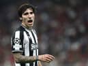 Sandro Tonali in action for Newcastle United against AC Milan.  