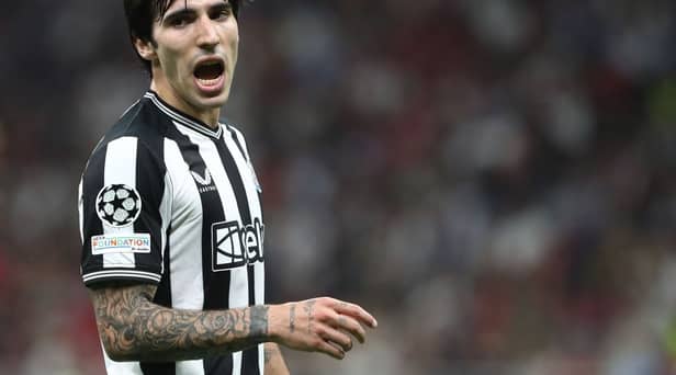 Sandro Tonali in action for Newcastle United against AC Milan.  
