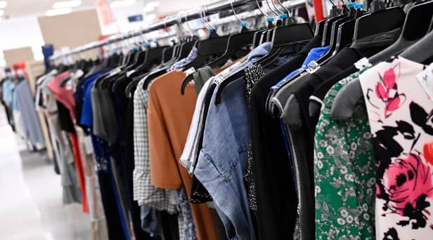 Clothes hanging in shop Picture: Getty