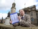 Councillor Paul Dean with the ‘winter readiness’ card
