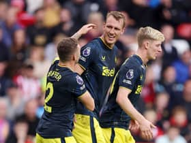 Dan Burn of Newcastle United celebrates with teammates after scoring the team’s second goal during the Premier League match between Sheffield United and Newcastle United at Bramall Lane on September 24, 2023 in Sheffield, England. (Photo by George Wood/Getty Images)