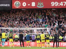 Newcastle United fans celebrate after the team's 0-8 victory during the Premier League match between Sheffield United and Newcastle United at Bramall Lane on September 24, 2023 in Sheffield, England. (Photo by George Wood/Getty Images)