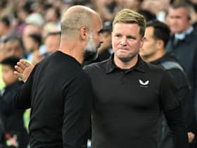MANCHESTER, ENGLAND - AUGUST 19: Eddie Howe, Manager of Newcastle United, interacts with Pep Guardiola, Manager of Manchester City, prior to the Premier League match between Manchester City and Newcastle United at Etihad Stadium on August 19, 2023 in Manchester, England. (Photo by Michael Regan/Getty Images)