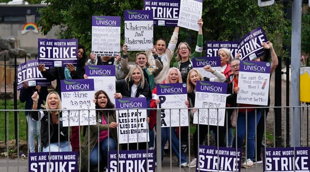 School support workers, cleaning staff and janitors are currently on strike in Scotland as the Unison union remains locked in a pay dispute with education chiefs. (Credit: Jane Barlow/PA Wire)