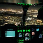 Two men have been arrested for allegedly shining a laser pen in the eyes of a police helicopter pilot in South Shields.