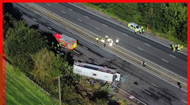 Emergency services at the scene of a coach crash on the M53 motorway, between junction 5 at Ellesmere Port and junction 4 at Bebbington. 