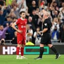 Simon Hooper against Liverpool last season. 