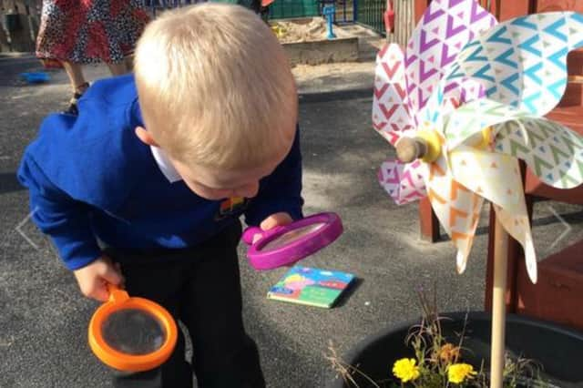 Elijah playing at nursery