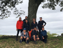Back left to right:  Alison Wilson, Simon Tate, Angie Comerford, Kirsty Robson, and Stephanie McDowell. Front left to right: Emma Butler, Steph Comerford and Paul Rogers under the Sycamore Gap tree.