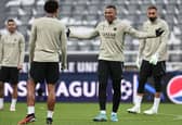 Paris Saint-Germain's French forward #07 Kylian Mbappe (2R) talks with Paris Saint-Germain's Brazilian defender #05 Marquinhos (2L) during a team training session at St James's Park stadium in Newcastle-upon-Tyne, north east England on October 3, 2023, on the eve of their UEFA Champions League group F football match against Newcastle United. (Photo by FRANCK FIFE / AFP) (Photo by FRANCK FIFE/AFP via Getty Images)