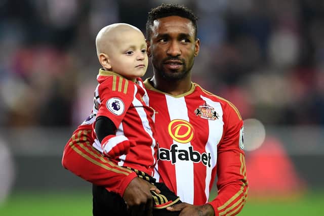 Bradley Lowery with Jermain Defoe. (Photo by Laurence Griffiths/Getty Images)